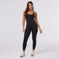 Tavi Noir ชุดจั้มออกกำลังกายรุ่น Symmetry Bodysuit Ebony